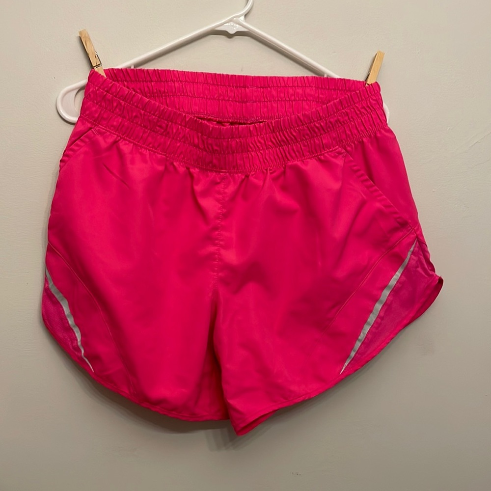Neon pink athletic shorts